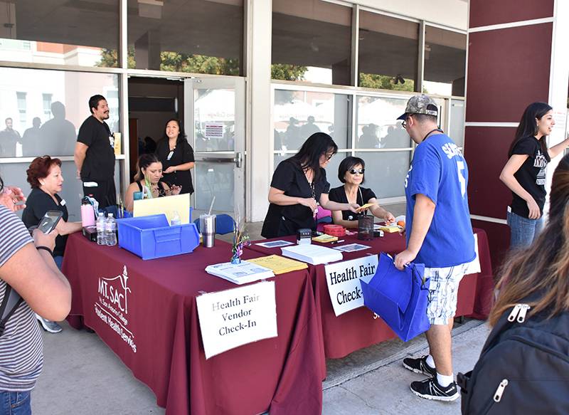 image of a previous student health fair check-in table