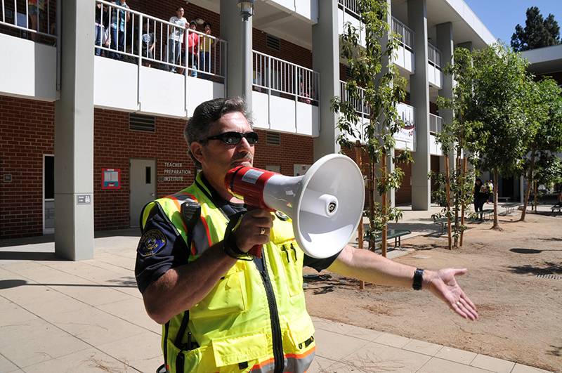 public safety personnel using a bullhorn