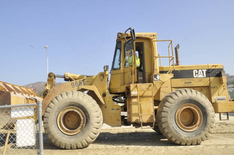 A bulldozer at the stadium construction site