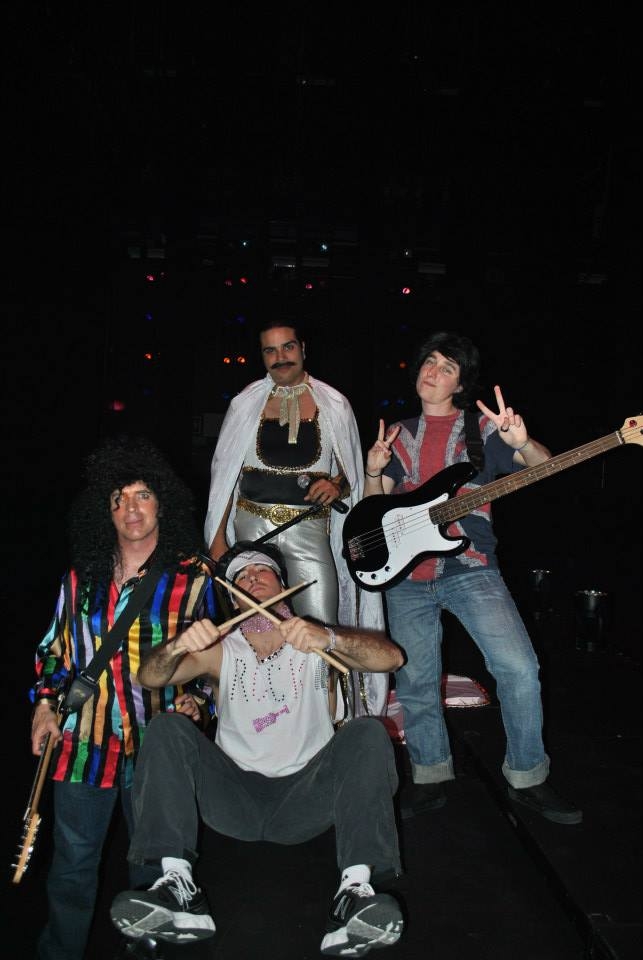 Prof. Rickard as a member of the band Queen in Puttin' on the Hits