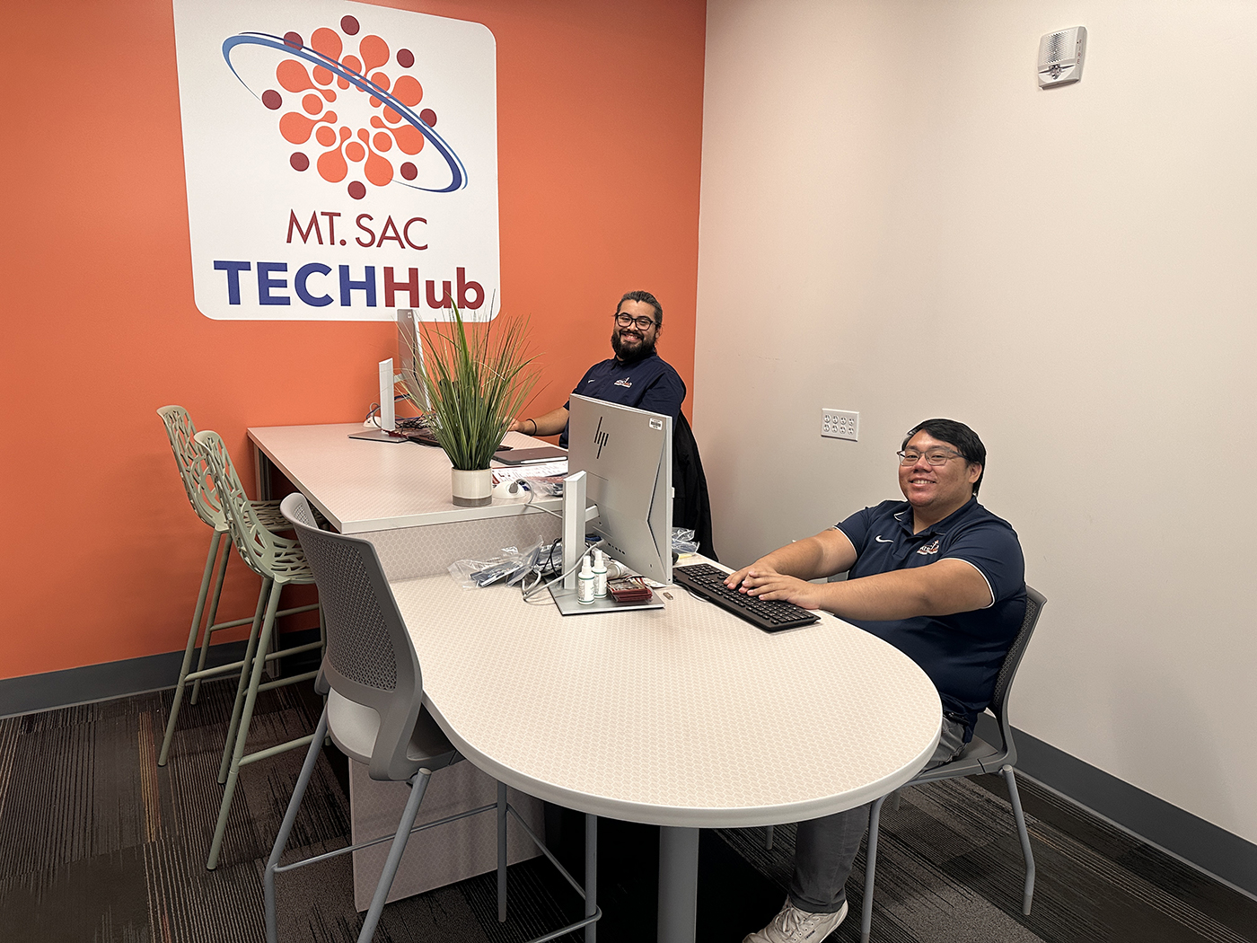 Mt. SAC TechHub staff work on their computers inside their office.
