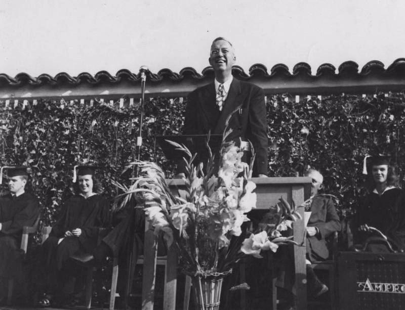Mt. SAC's first president, Dr. George Bell, at the college's first graduation in 1947, reads a telegram from California Governor Earl Warren: "Thought you and your graduates might be interested to know I am today signing Assembly Bill 1904 making it possible for you to acquire the present site as a permanent home for Mount San Antonio College." Mt. SAC's first president, Dr. George Bell, at the college's first graduation in 1947, reads a telegram from California Governor Earl Warren: "Thought you and your graduates might be interested to know I am today signing Assembly Bill 1904 making it possible for you to acquire the present site as a permanent home for Mount San Antonio College."