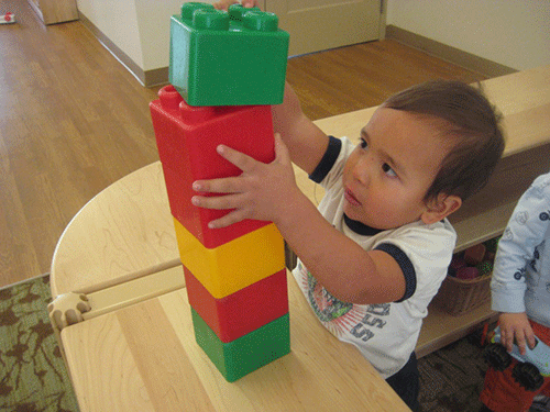 Child Playing with Blocks