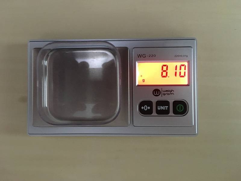Picture showing balance with weigh boat and digital readout