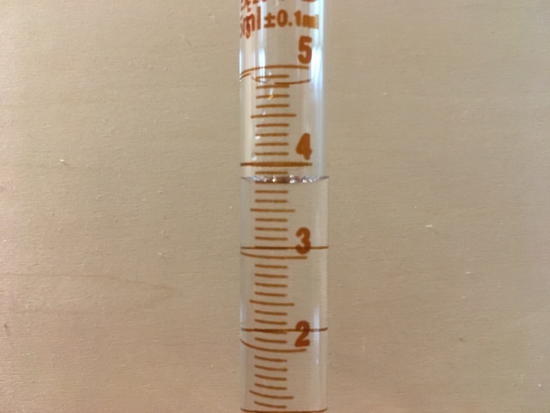 10 mL graduated cylinder filled for measurement practice