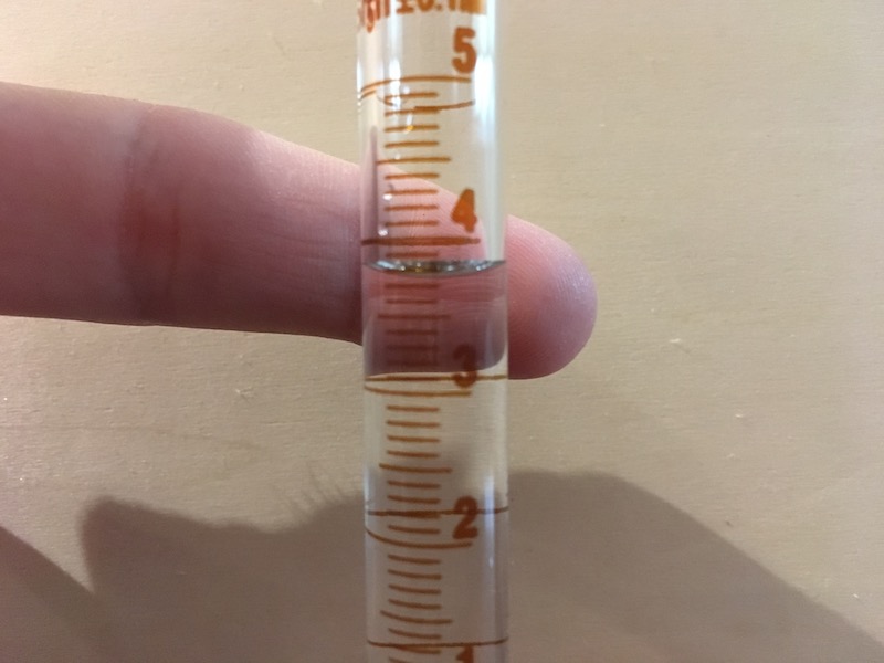 10 mL graduated cylinder filled for measurement practice
