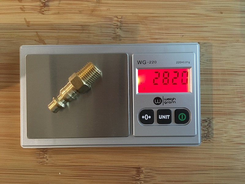 Object on centigram balance for measuring mass