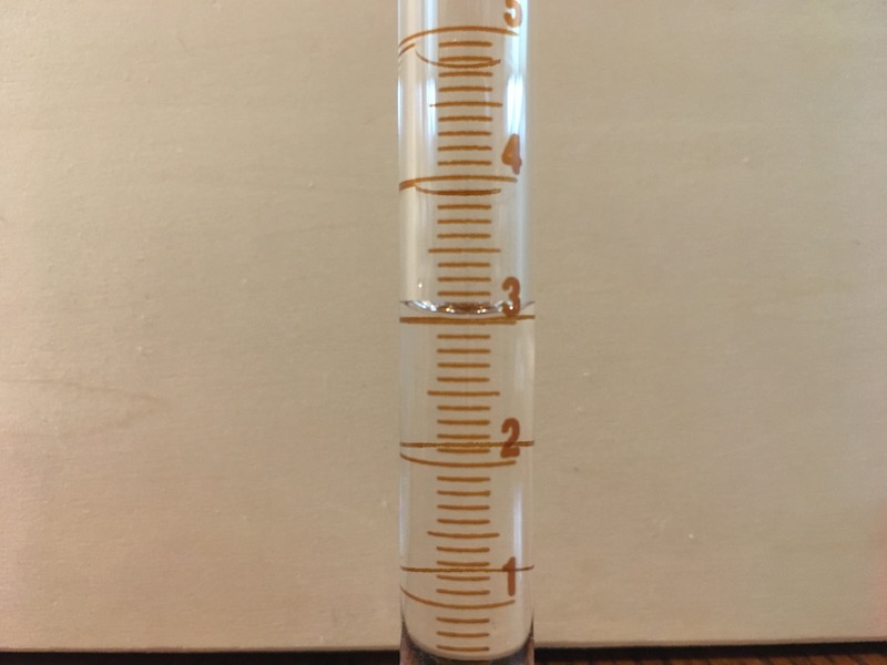 10 mL graduated cylinder filled for measurement practice