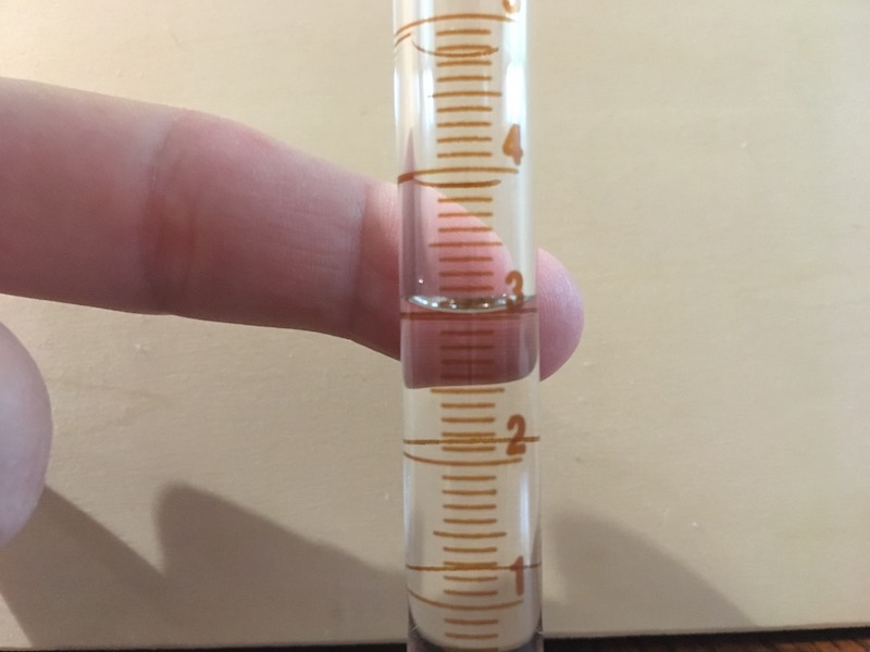 10 mL graduated cylinder filled for measurement practice