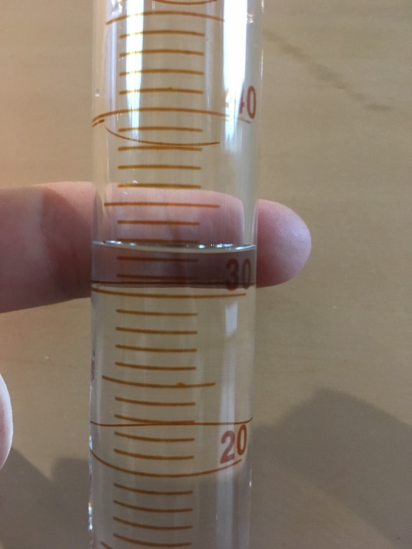 10 mL graduated cylinder filled for measurement practice