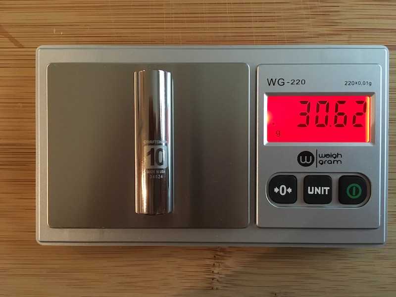 Object on centigram balance for measuring mass