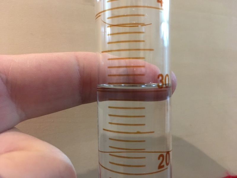 Graduated cylinder with water (and contrast) for measurement