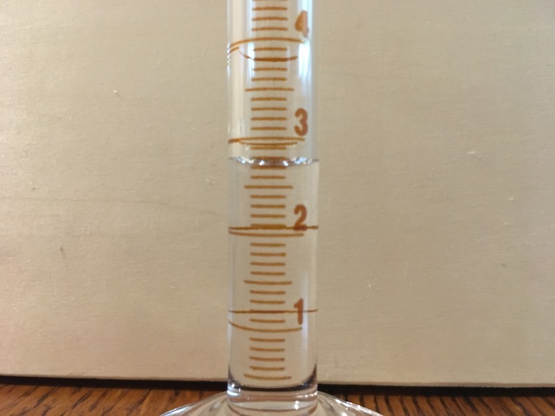 10 mL graduated cylinder filled for measurement practice