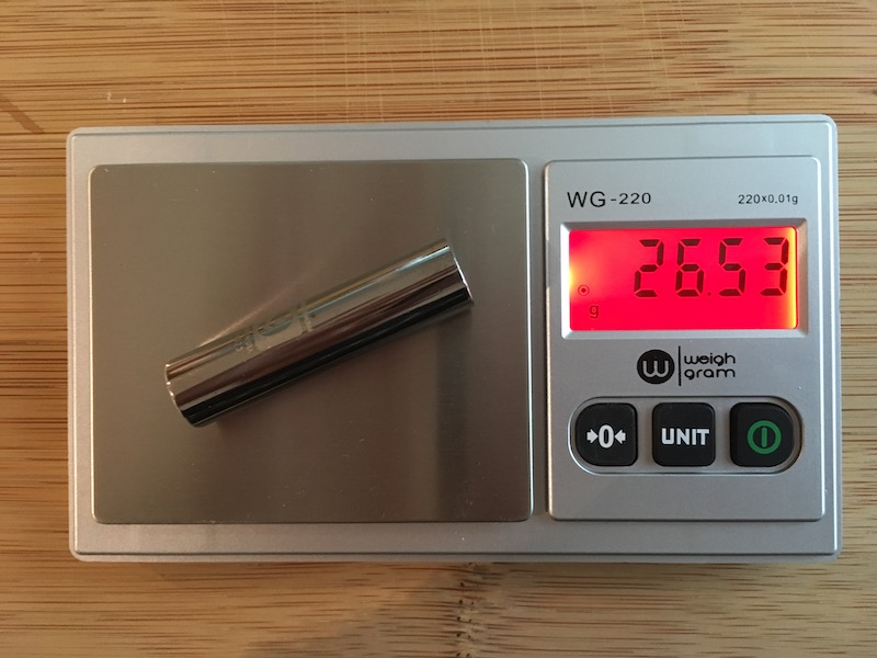 Object on centigram balance for measuring mass