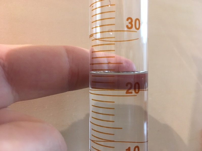 Graduated cylinder with water (and contrast) for measurement