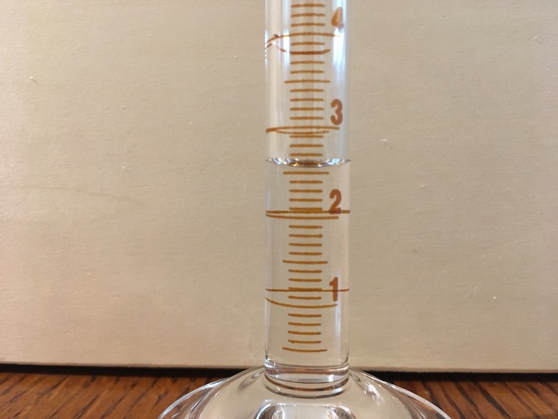 10 mL graduated cylinder filled for measurement practice