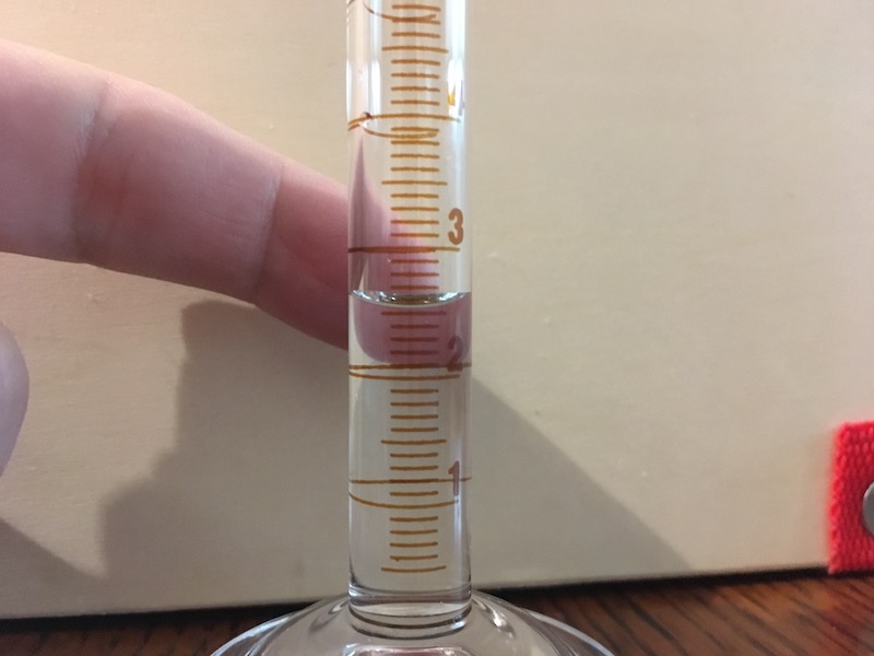 10 mL graduated cylinder filled for measurement practice