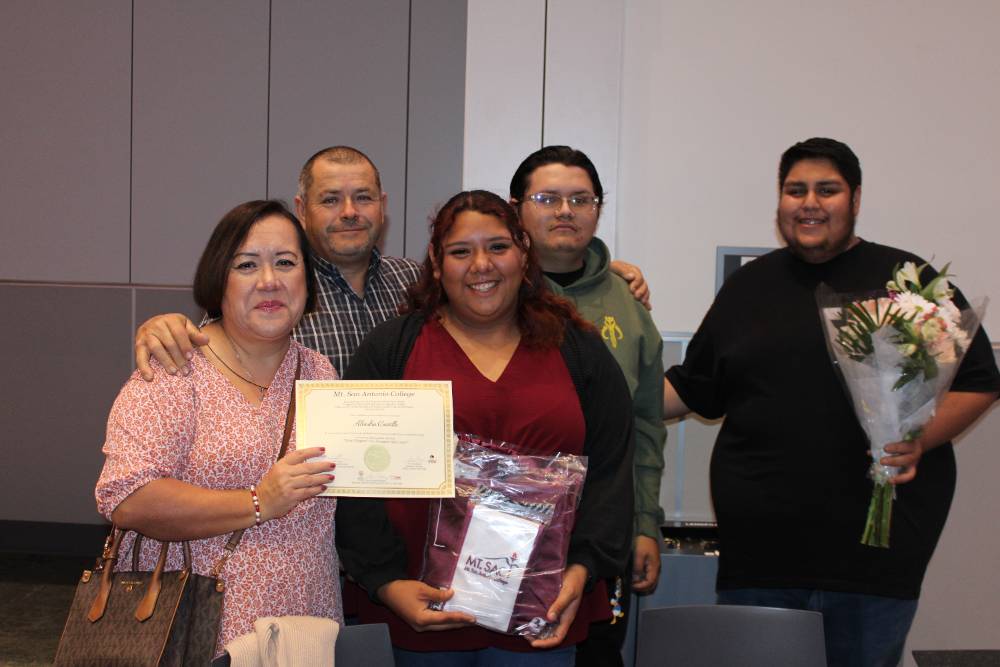 EOPS grad with family