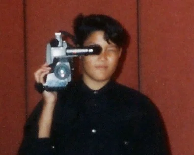 Augie as a kid with a camera