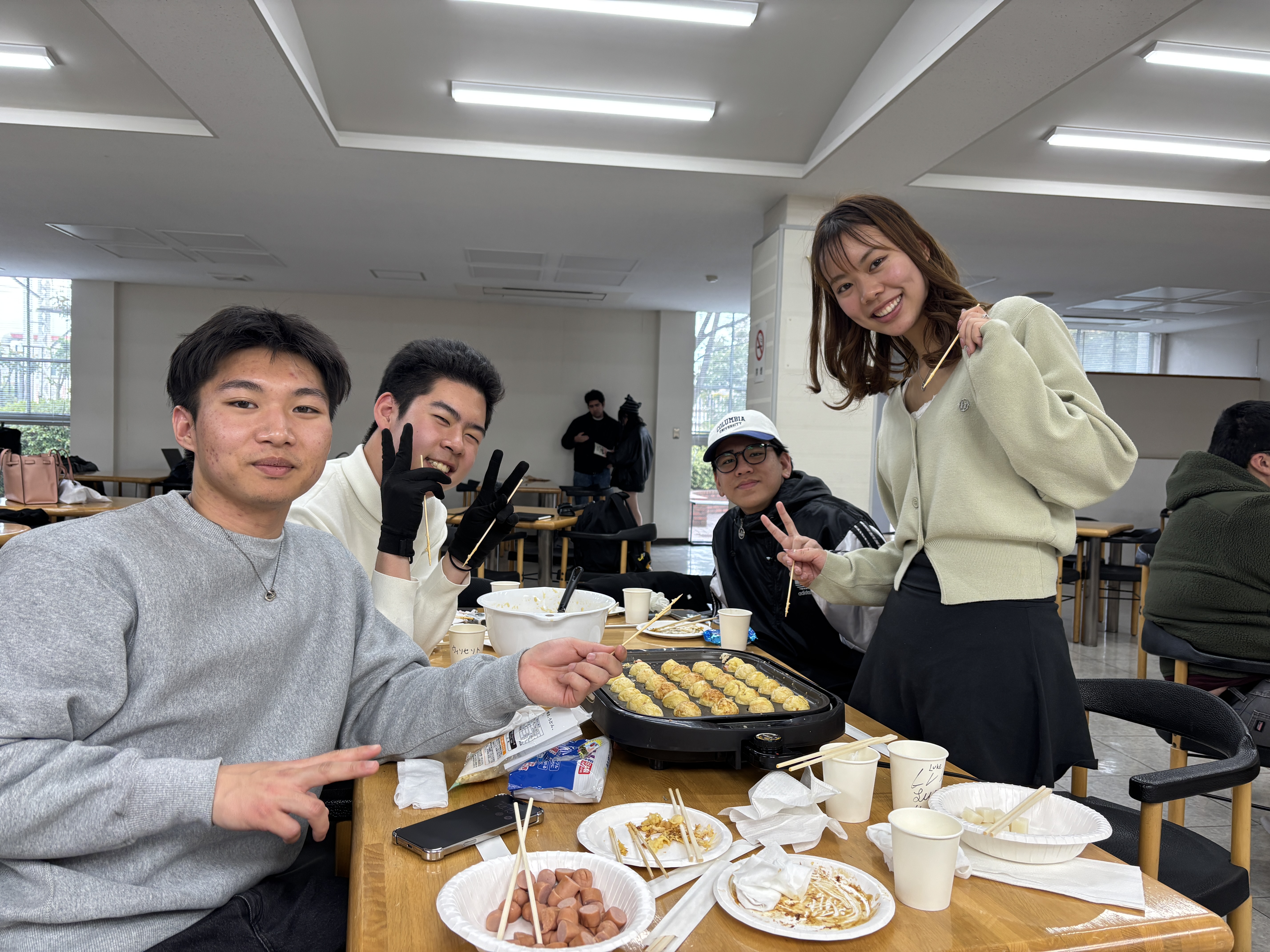 Mt SAC students making takoyaki with a Japanese students
