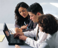 students asking questions from a computer