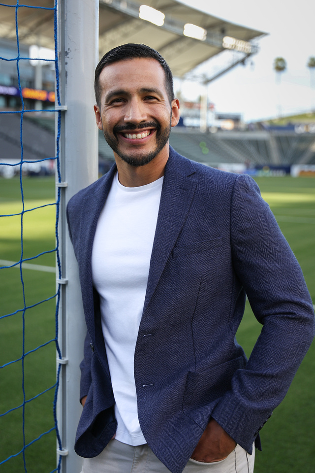 Urel Martinez stands in front of a soccer net