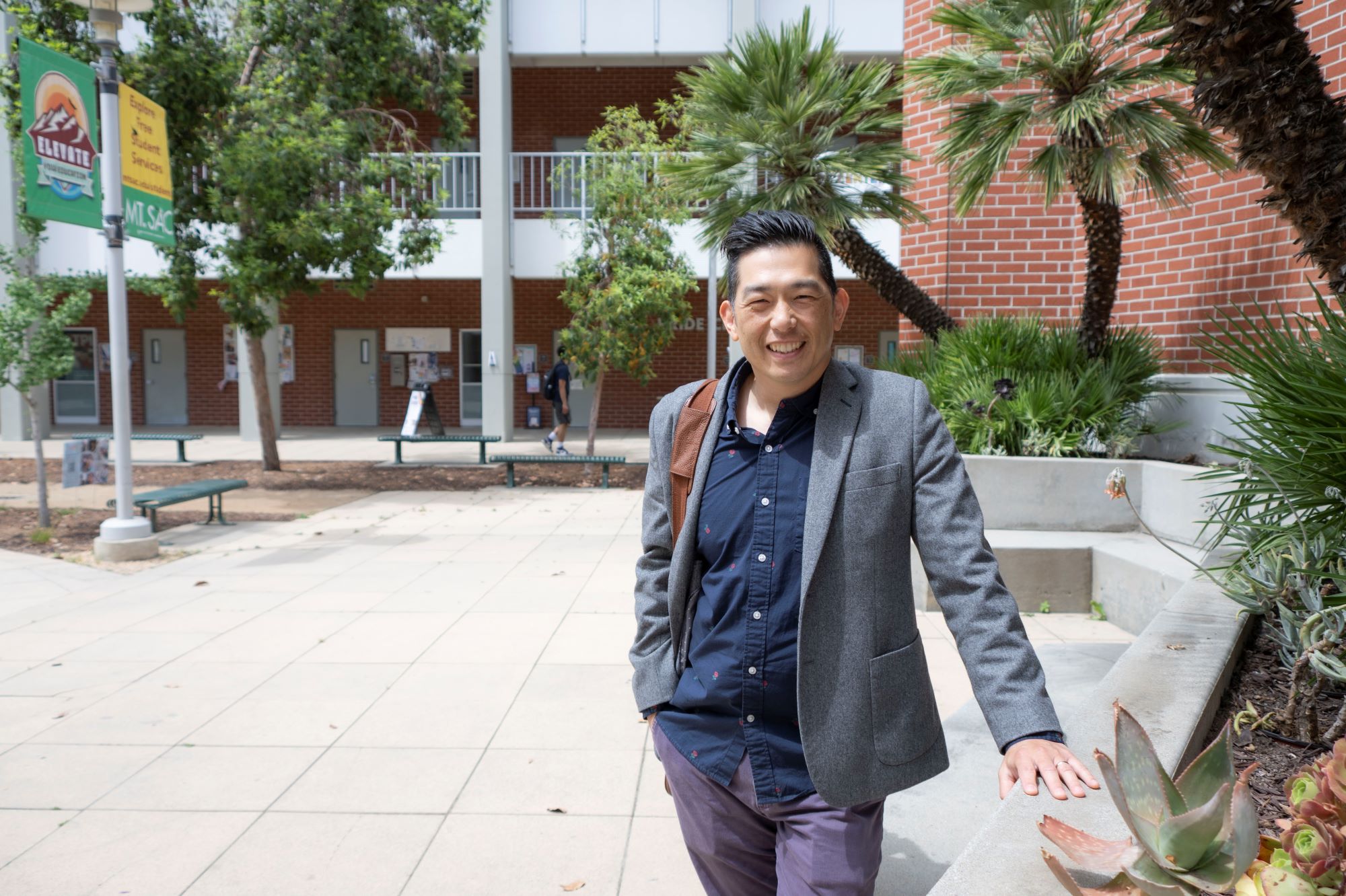 James Koh on campus near clocktower