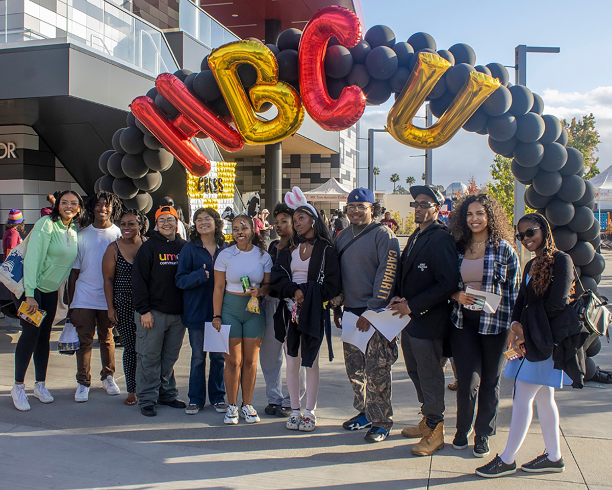 Students pose for a group photo at an HBCU Caravan College Fair.
