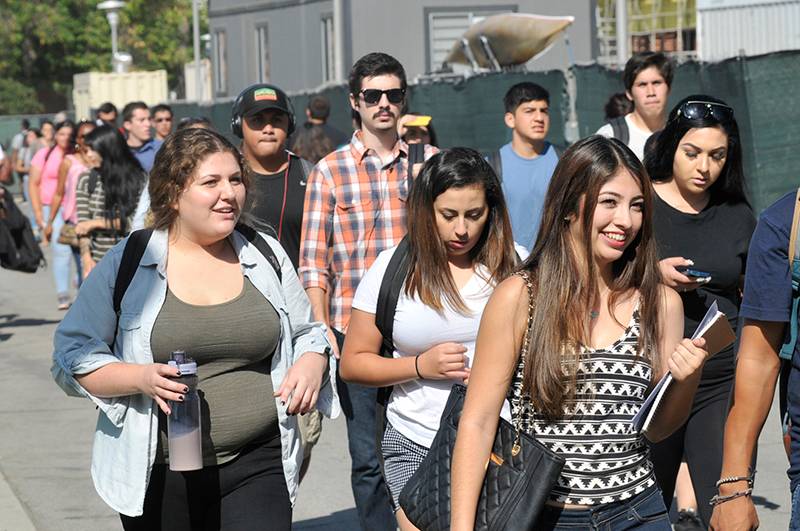 a crowd of students walking