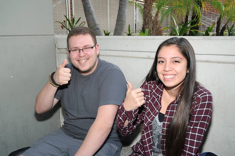 two students with thumbs up