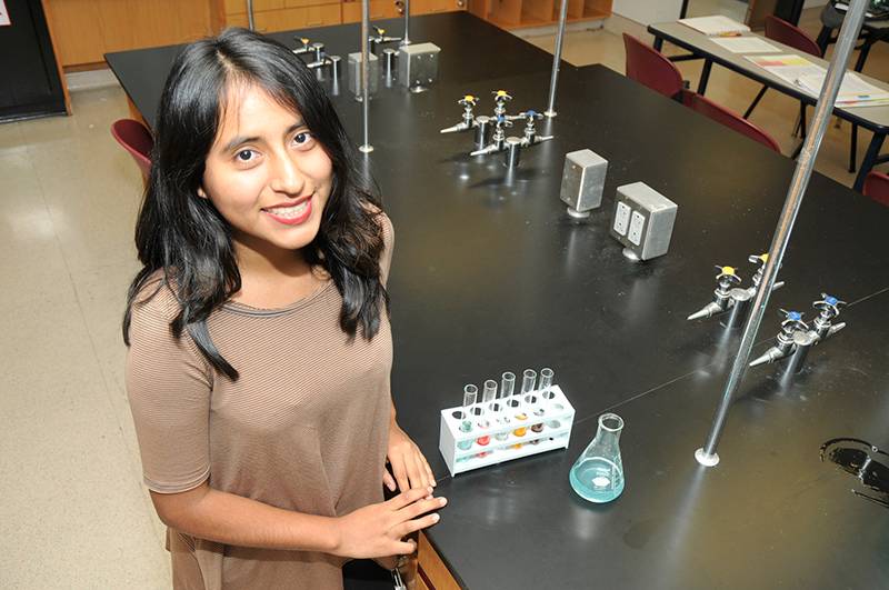 a chemistry student in a lab