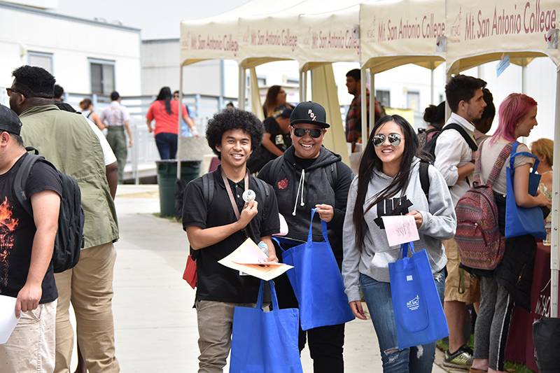 an image of students at a previous student services fair