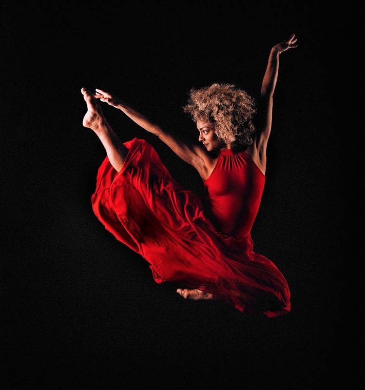 photo of a dance in a red dress