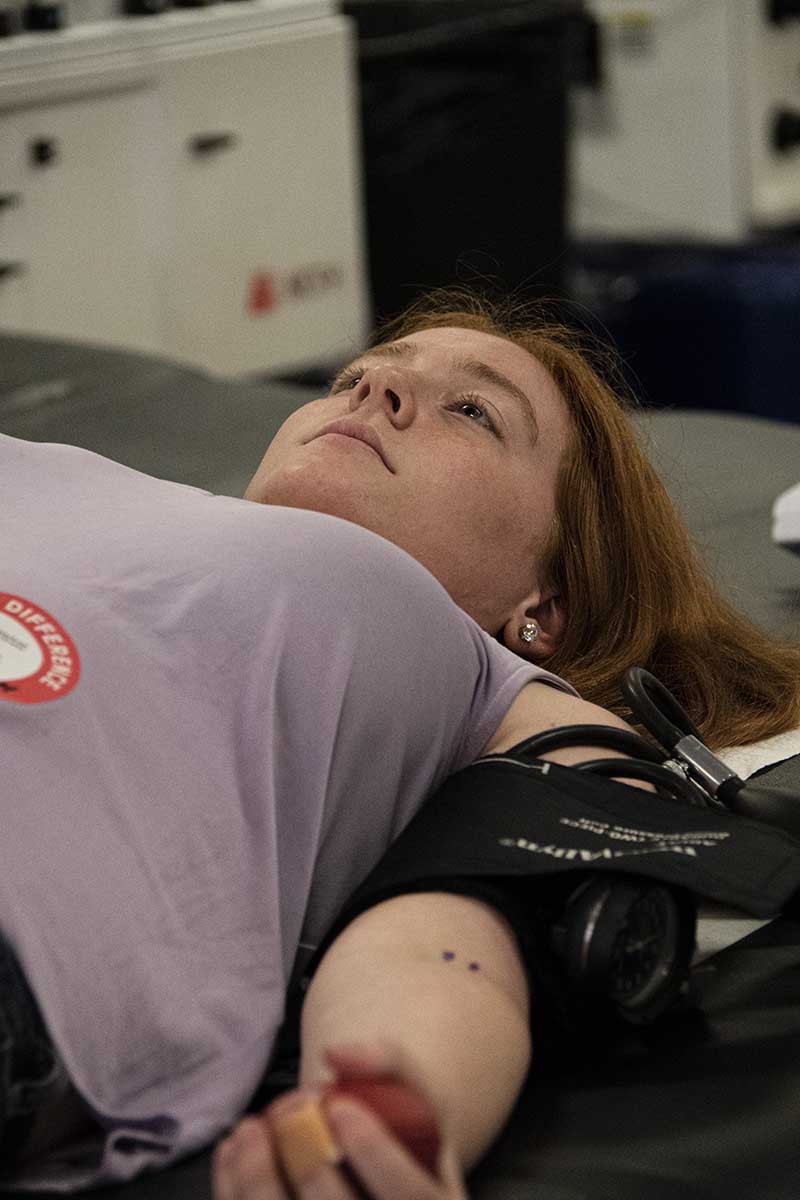 A student gives blood