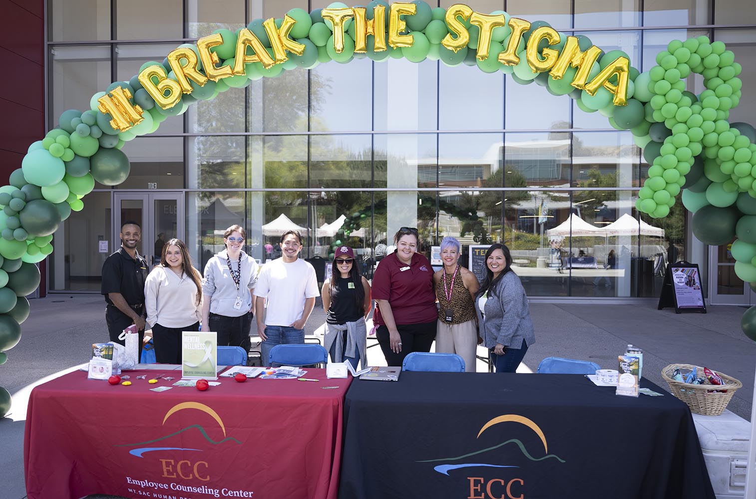 Employees pose for a photo at a wellness fair event at Mt. SAC.
