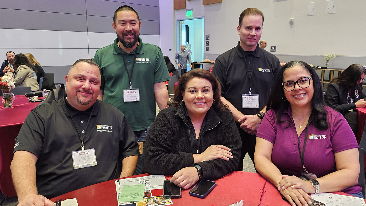 A group of employers pose for a photo at the Employer Open House at Mt. SAC.