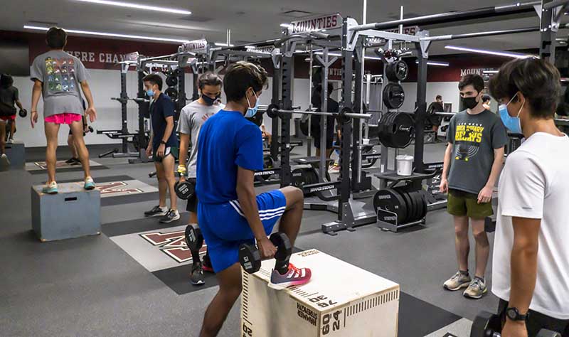 Students train inside Stadium's weight room