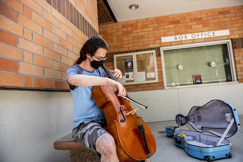 Student plays cello