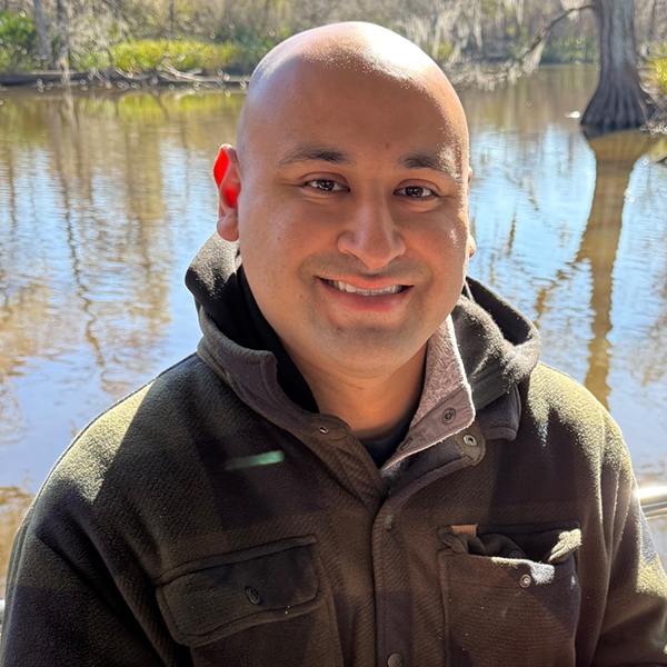 Mt. SAC adjunct chemistry professor Shaun Galvan smiles for a photo.