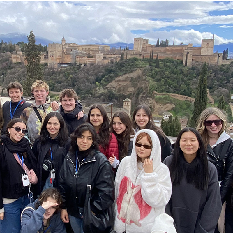 Study Abroad students pose for a photo on a trip across the sea.