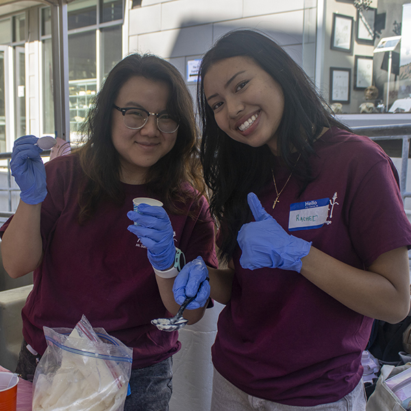 A pair of Mt. SAC science students give thumbs up.