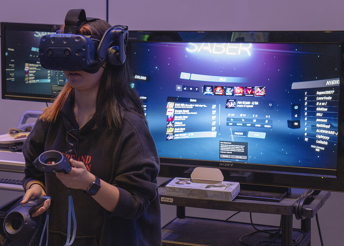 A student plays a virtual reality game at the Animation and Gamefest event.