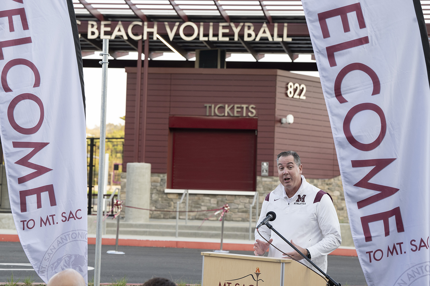 Joe Jennum introducing the new beach volleyball courts. 