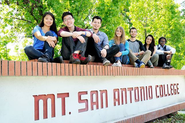 Students sitting on Mt Sac logo