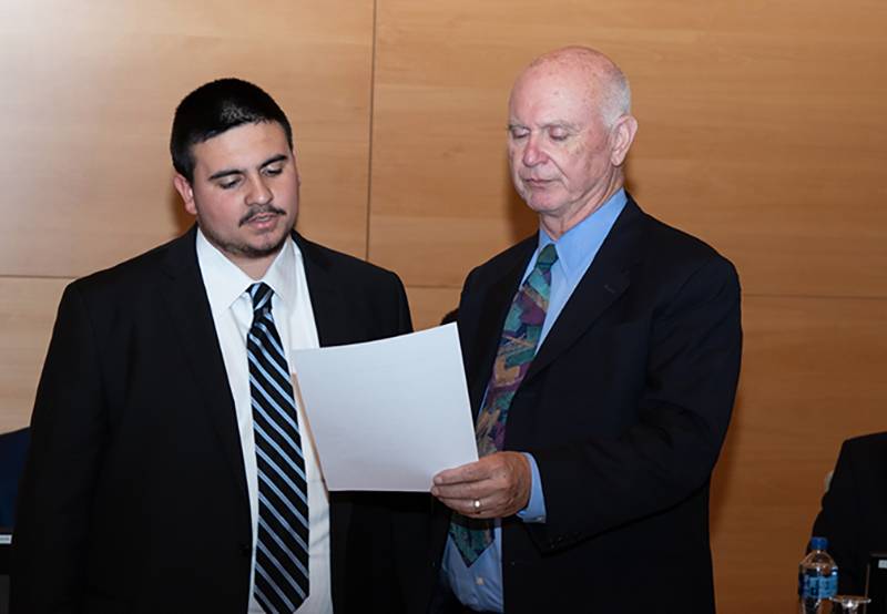 New student trustee Gabriel Alfaro is sworn in by Mt. SAC President William Scroggins