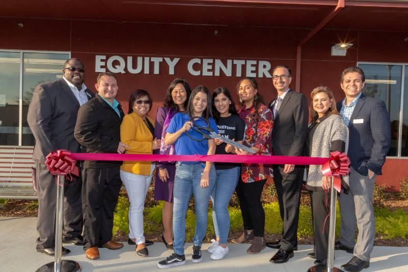 Students and staff cut the ribbon