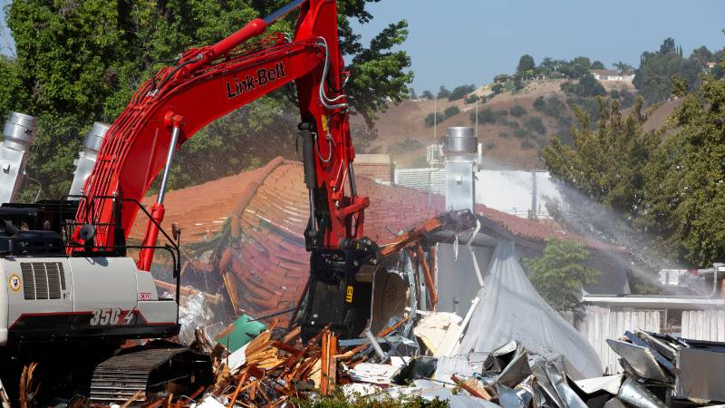 Bulldozer demos building 19B