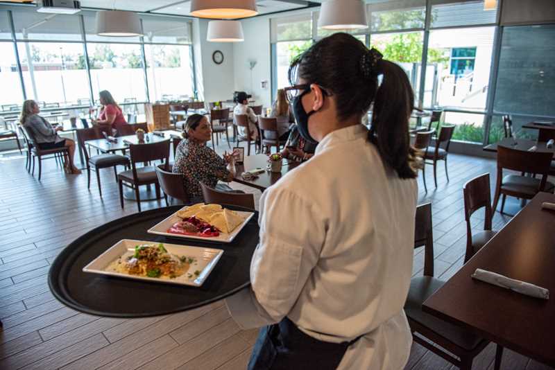 Student delivers dishes