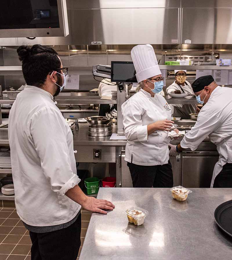 Students prepare a takeout order