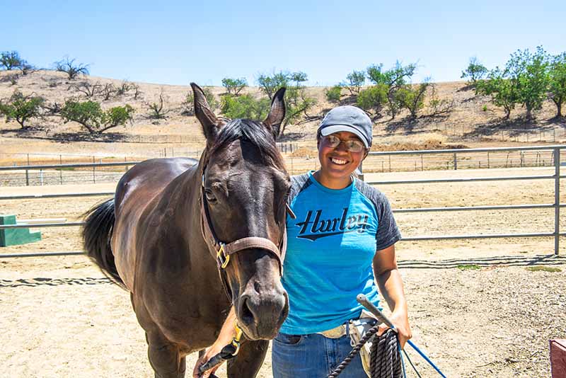 Student with breeding horse